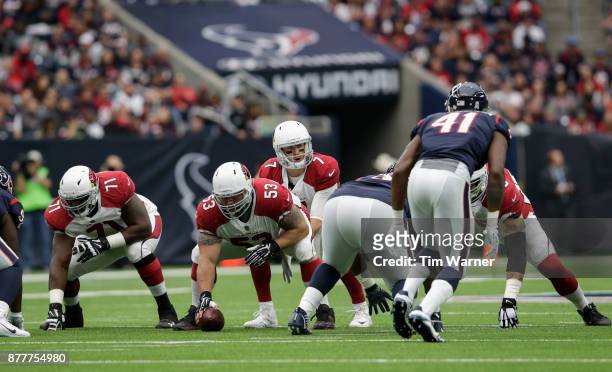 Blaine Gabbert of the Arizona Cardinals prepares for a snap at the line of scrimmage against the Houston Texans in the first quarter at NRG Stadium...