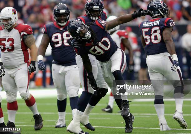 Jadeveon Clowney of the Houston Texans celebrates after a sack in the fourth quarter against the Arizona Cardinals at NRG Stadium on November 19,...