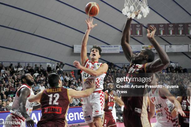 Tommaso Laquintana and Jaylen Bond and Daniele Magro of The Flexx competes with Gediminas Orelik and Dominique Johnson and Paul Stephan Biligha and...