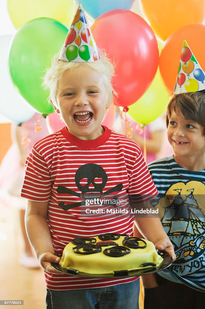 Two boys at a childrens party Sweden.