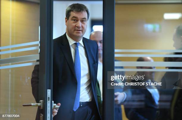 Bavarian Finance Minister Markus Soeder leaves a CSU fraction meeting at the state parliament in Munich, southern Germany, on November 23, 2017.