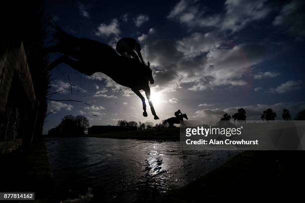 General view as runners clear the water jump at Wincanton racecourse on November 23, 2017 in Wincanton, United Kingdom.