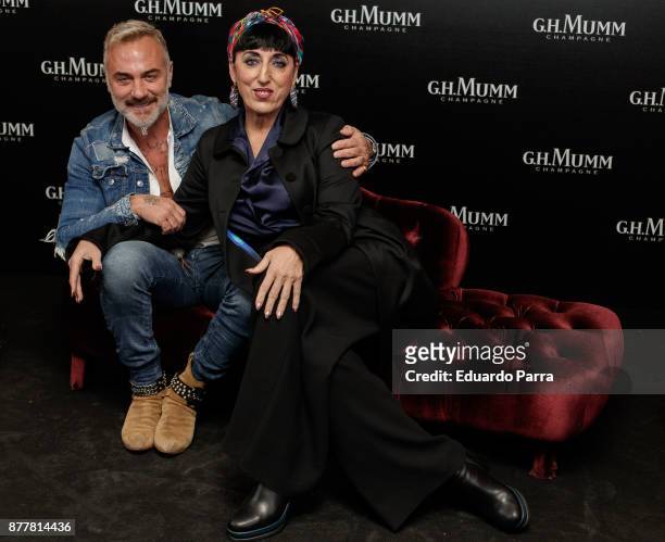 Italian Dj Gianluca Vacchi and Spanish actress Rossy de Palma attend the opening of the 'House Of G.H. Mumm' on November 23, 2017 in Madrid, Spain.
