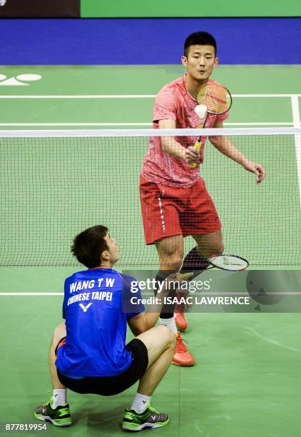 China's Chen Long hits a shot against Taiwan's Tzu Wei Wang during their quarterfinal men's singles match at the Hong Kong Open badminton tournament...