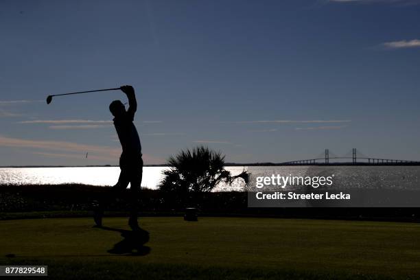 Brian Gay of the United States plays his shot from the 14th tee during the final round of The RSM Classic at Sea Island Golf Club Seaside Course on...