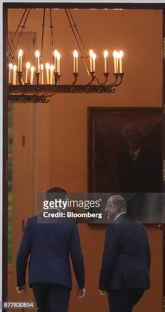 Martin Schulz, leader of the Social Democrat Party , right, arrives for talks with Germany's President Frank-Walter Steinmeier at the Schloss...