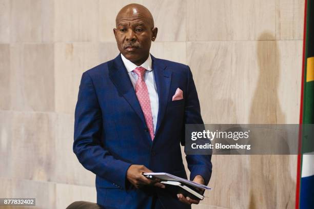 Lesetja Kganyago, governor of South Africa's central bank, arrives for a news conference following a Monetary Policy Committee meeting in Pretoria,...