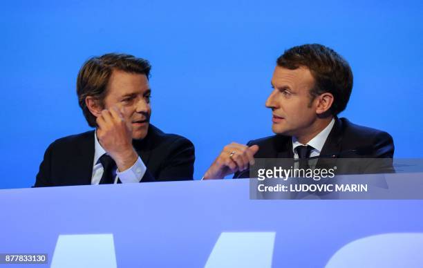 French President Emmanuel Macron and Mayor of Troyes and President of the Association of Mayors of France Francois Baroin attend the 100th French...