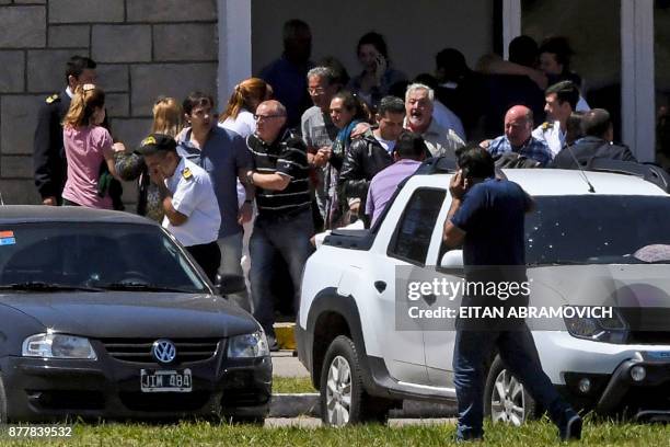 Relatives and comrades of 44 crew members of Argentine missing submarine express their grief at Argentina's Navy base in Mar del Plata, on the...