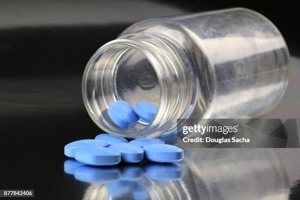 blue prescription pills for sexual issues and erectile dysfunction - viagra stock pictures, royalty-free photos & images