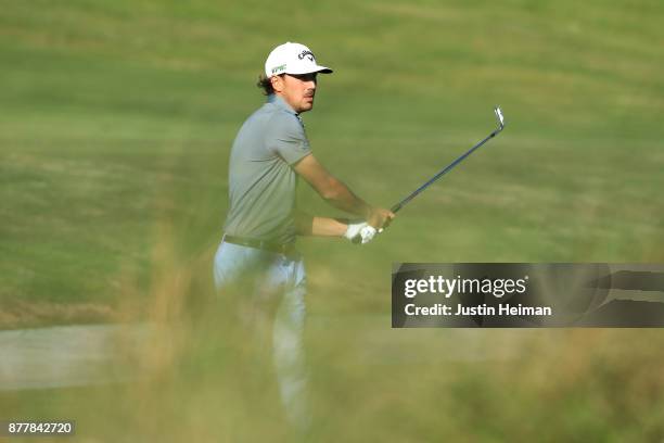 Kelly Kraft of the United States plays his second shot on the 18th hole during the final round of The RSM Classic at Sea Island Golf Club Seaside...