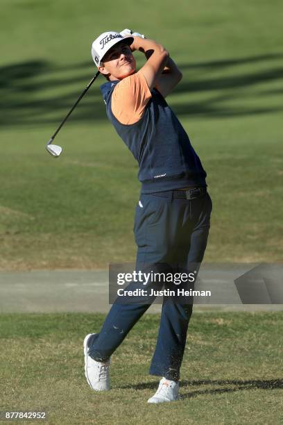 Blayne Barber of the United States plays his second shot on the 18th hole during the final round of The RSM Classic at Sea Island Golf Club Seaside...