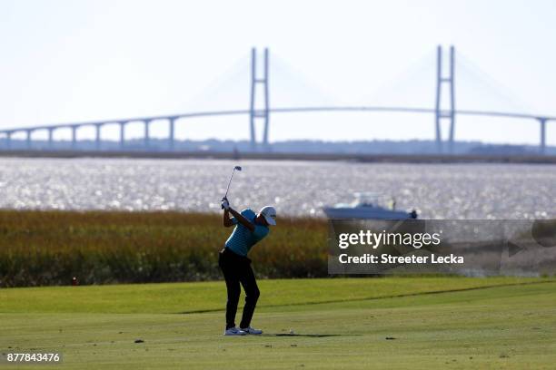 Aaron Wise of United States plays a shot on the 13th hole during the final round of The RSM Classic at Sea Island Golf Club Seaside Course on...