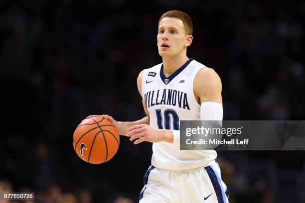 Donte DiVincenzo of the Villanova Wildcats dribbles the ball against the Columbia Lions at the Wells Fargo Center on November 10, 2017 in...