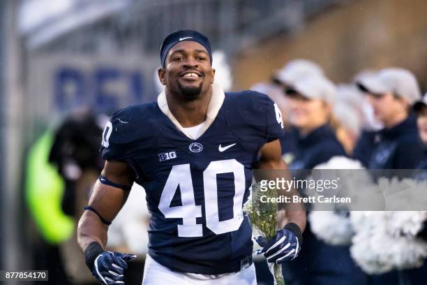 Jason Cabinda of the Penn State Nittany Lions participates in a pregame ceremony honoring seniors before the game against the Nebraska Cornhuskers on...