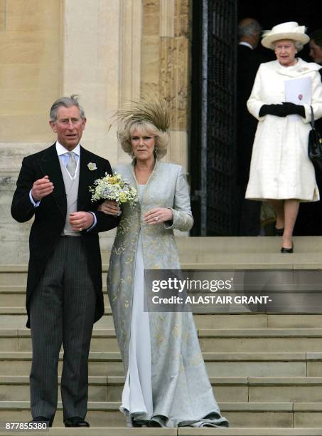 Britain's Prince Charles and his bride Camila Duchess of Cornwall leave St George's Chapel in Windsor following the church blessing of their civil...