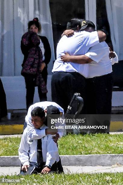 Relatives and comrades of 44 crew members of Argentine missing submarine, express their grief at Argentina's Navy base in Mar del Plata, on the...