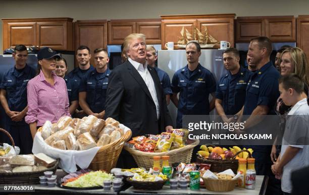 President Donald Trump and First Lady Melania Trump visit members of the US Coast Guard at Station Lake Worth Inlet in Riviera Beach, Florida on...