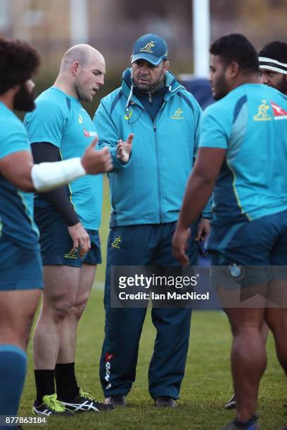 Stephen Moore of Australia talks with Michael Cheika, head coach of Australia during training during Australia media access ahead of the...