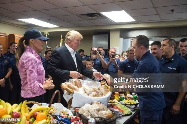 President Donald Trump and First Lady Melania Trump visit members of the US Coast Guard at Station Lake Worth Inlet in Riviera Beach, Florida on...