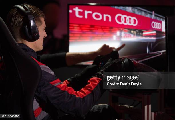 Toni Kroos of Real Madrid CF in action in his simulated car during a race with his teammates during the Audi Handover Sponsorship deal with Real...