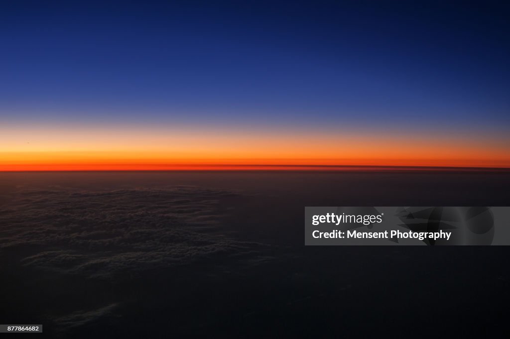 Colourful scenery of rising sun over the horizon