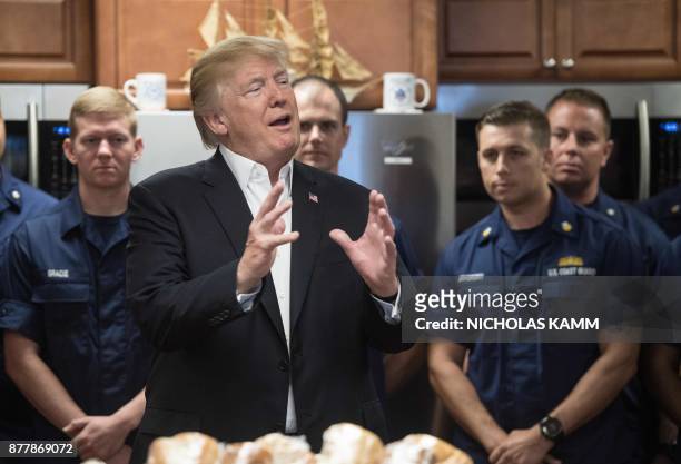 President Donald Trump visits members of the US Coast Guard at Station Lake Worth Inlet in Riviera Beach, Florida on Thanksgiving day November 23,...