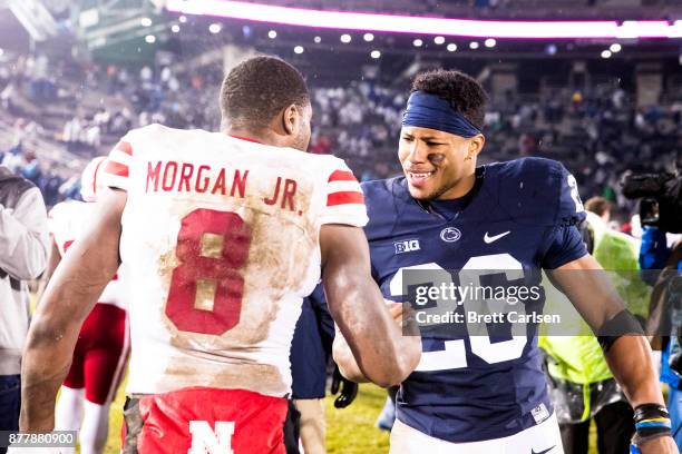 Saquon Barkley of the Penn State Nittany Lions shakes hands with Stanley Morgan Jr. #8 of the Nebraska Cornhuskers after the game on November 18,...