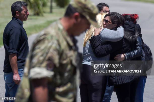 Relatives and comrades of 44 crew members of Argentine missing submarine, express their grief as they arrive at Argentina's Navy base in Mar del...