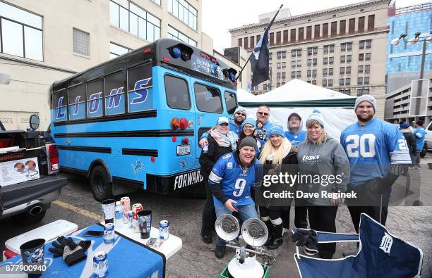 Detroit Lions fans tailgate before the start of the Detroit Lions and Minnesota Vikings NFL game at Ford Field on November 23, 2017 in Detroit,...