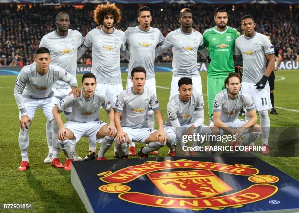 Manchester United footballers : back row: Belgian striker Romelu Lukaku, Belgian midfielder Marouane Fellaini, English defender Chris Smalling,...