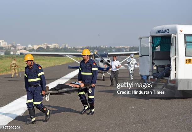 Airport authority of India, Maharashtra police and state fire brigade conduct a safety mock drill at Juhu Airport on November 22, 2017 in Mumbai,...