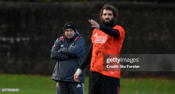 New Zealand All Blacks coach Steve Hansen oversees training as Samuel Whitelock makes a point prior to Saturday's International against Wales at...