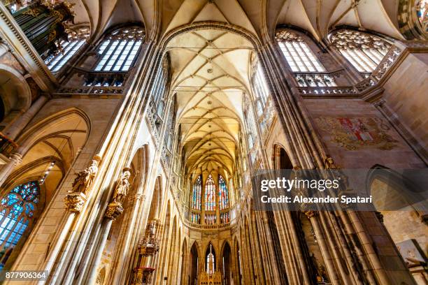 interiors of st vitus cathedral, wenceslaus and adalbert, prague, czech republic - stained glass czech republic stock pictures, royalty-free photos & images