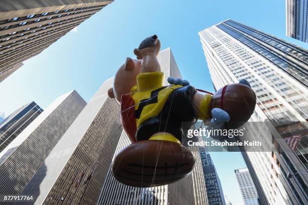 The Charlie Brown balloon floats on 6th Ave. During the annual Macy's Thanksgiving Day parade on November 23, 2017 in New York City. The Macy's...