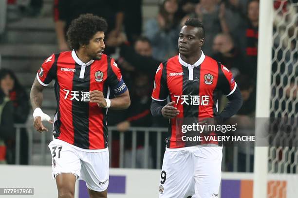 Nice's Italian forward Mario Balotelli celebrates with his teammates after scoring a goal during the UEFA Europa League football match between OGC...