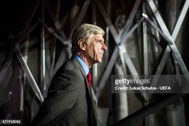 Head Coach Arsene Wenger of Arsenal enters the pitch through the player tunnel prior to the UEFA Europa League group H match between 1. FC Koeln and...