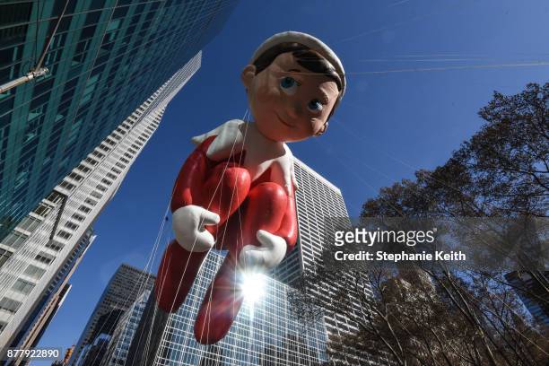 The Elf on the Shelf balloon floats on 6th Ave. During the annual Macy's Thanksgiving Day parade on November 23, 2017 in New York City. The Macy's...