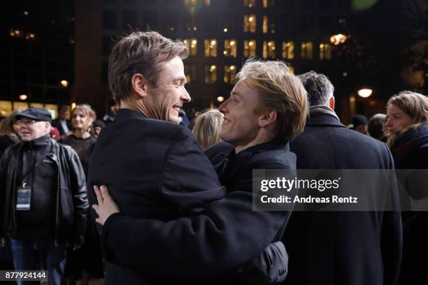 Andreas Pietschmann and Louis Hofmann attend the premiere of the first German Netflix series 'Dark' at Zoo Palast on November 20, 2017 in Berlin,...