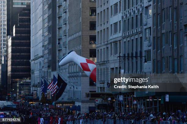 The foot of Power Ranger balloon turns a corner during the annual Macy's Thanksgiving Day parade on November 23, 2017 in New York City. The Macy's...