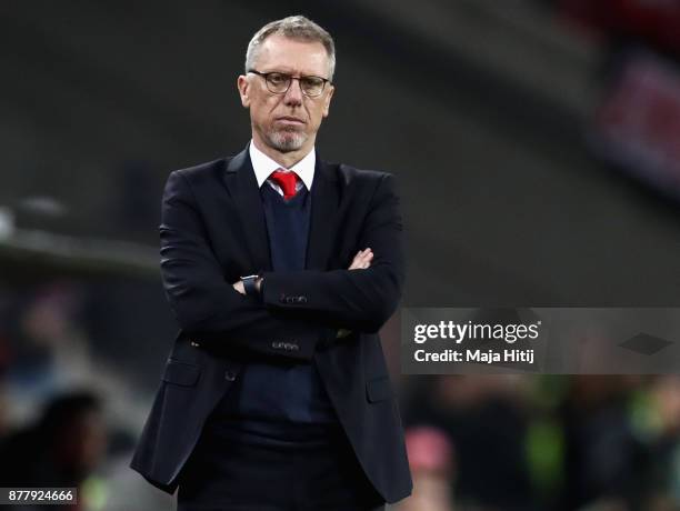 Peter Stoeger, coach of FC Koeln looks on during the UEFA Europa League group H match between 1. FC Koeln and Arsenal FC at RheinEnergieStadion on...