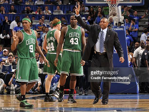 Rajon Rondo and head coach Doc Rivers of the Boston Celtics react to a call during the game against the Orlando Magic in Game Six of the Eastern...