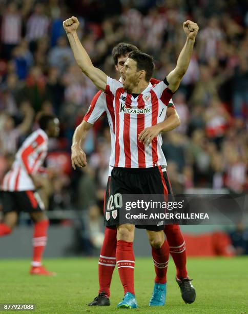 Athletic Bilbao's Spanish forward Aritz Aduriz celebrates after scoring his team's first goal during the Europa League football match Athletic Club...