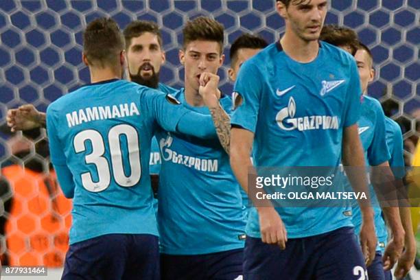 Zenit St. Petersburg's midfielder from Argentina Emiliano Rigoni celebrates after scoring the team's second goal during the UEFA Europa League Group...