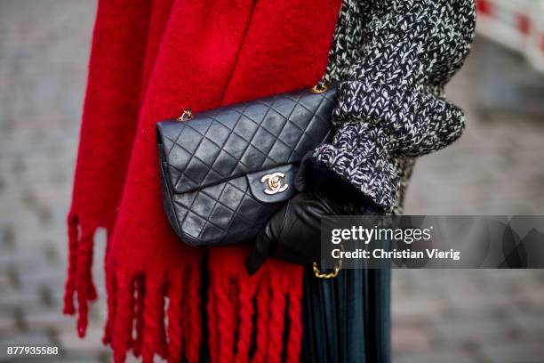 Sonia Lyson wearing black leather vintage hat, black ankle boots with fur Jimmy Choo, black Chanel bag, pleated midi skirt zara, grey knit Zara,...