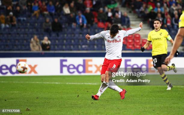 Hwang Hee-chan of Red Bull Salzburg scores a goal during the UEFA Europa League group I match between FC Salzburg and Vitoria Guimaraes at Red Bull...