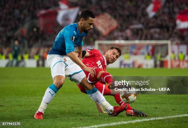 Francis Coquelin of Arsenal and Salih Oezcan of Koeln fight for the ball during the UEFA Europa League group H match between 1. FC Koeln and Arsenal...