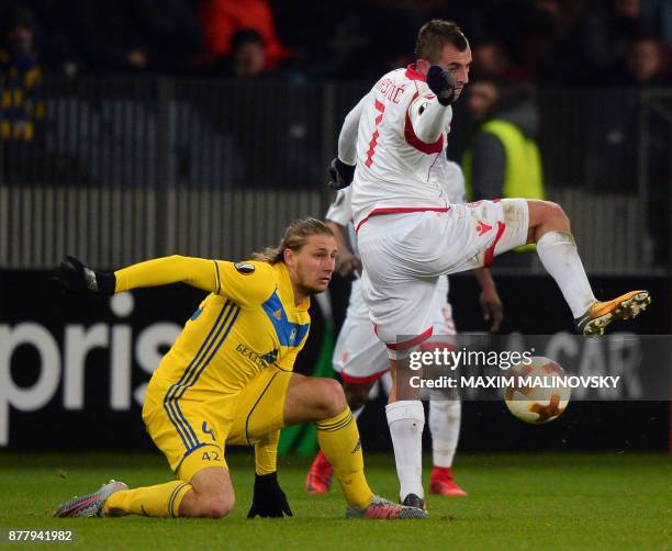 Borisov's defender from Belarus Maksim Valadzko and Crvena Zvezda Beograd's midfielder from Serbia Nenad Krsticic vie for the ball during the UEFA...