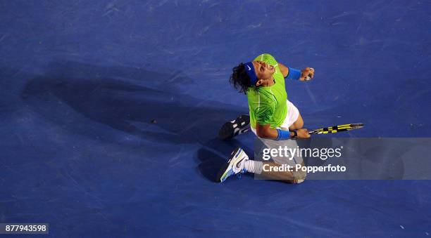 Rafael Nadal of Spain celebrates winning the 4th set during the men's singles final against Novak Djokovic of Serbia during day fourteen of the 2012...