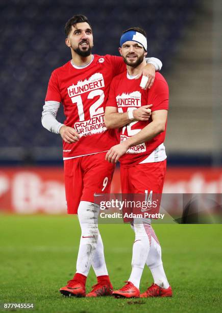 Munas Dabbur of Red Bull Salzburg and Valon Berisha of Red Bull Salzburg celebrate victory after the UEFA Europa League group I match between FC...